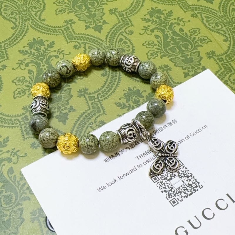 G*u*i bracelets
